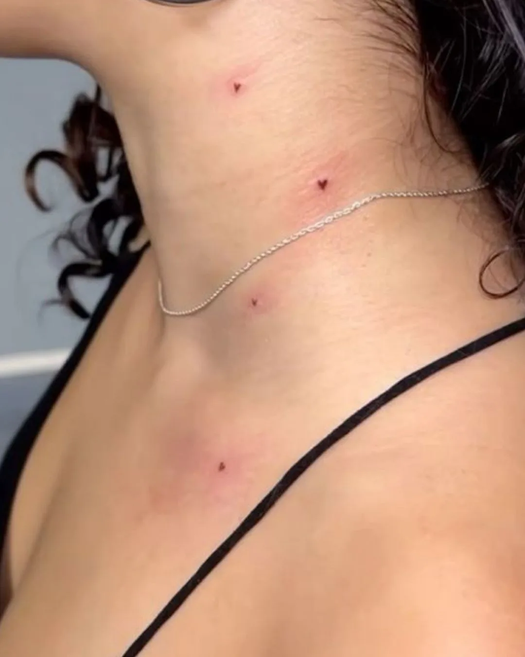 Grain de beaute coeur tatouage